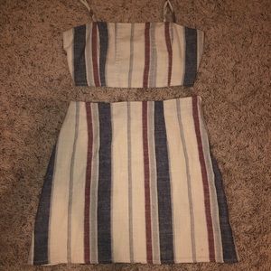 Two piece crop top and tight fitting skirt